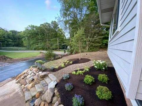 Fresh garden bed planting and mulch